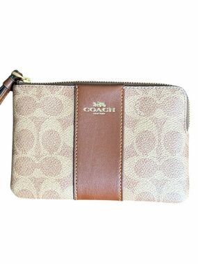 Coach Brown and Tan Canvas Zip wristlet with Gold Hardware